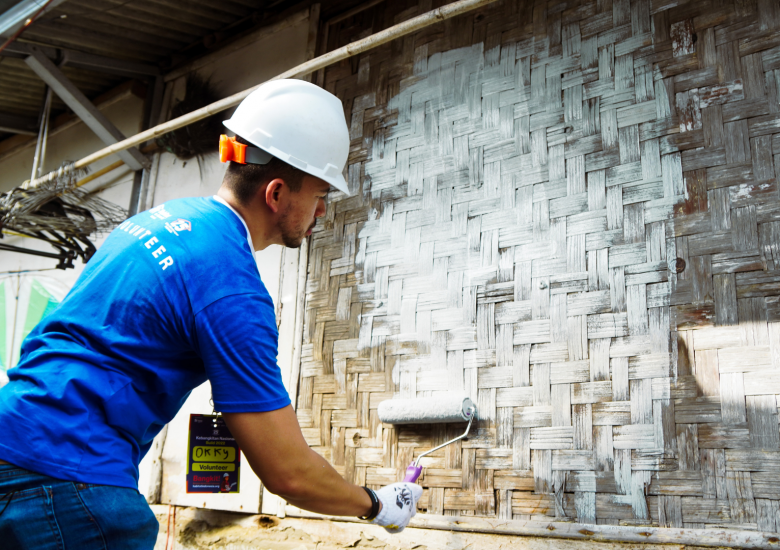 Habitat Indonesia and Volunteers Help Paint Houses for Low-Income Families